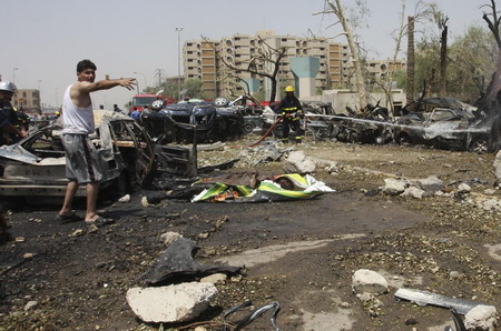 Waves of Baghdad blasts kill 97