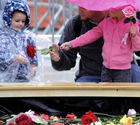 Eighth anniversary of 9/11 marked in rain