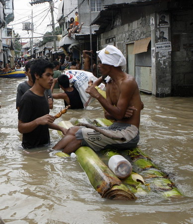 Philippine death toll rises, as new storms brew