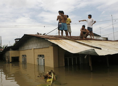 Philippine death toll rises, as new storms brew