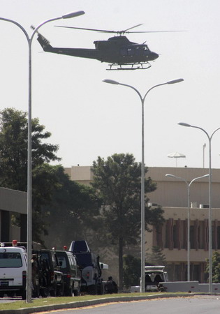 Pakistan commandos free 30 at army HQ, ending siege