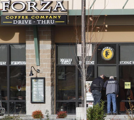 4 cops shot dead at US coffeehouse