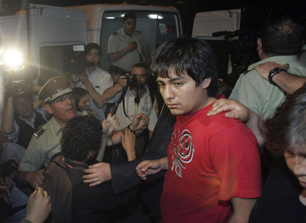 Students are arrested after occupying the Senate headquarters in Santiago Oct 20, 2011. Chile students storm Senate building