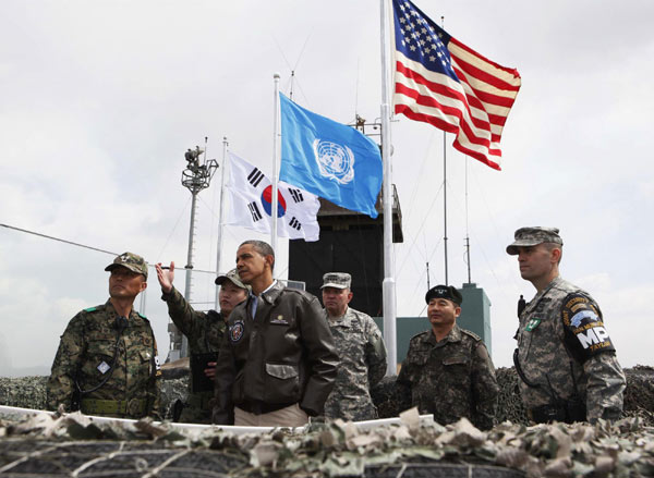 Obama visits Korean border ahead of nuclear summit