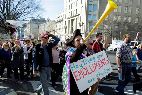 Thousands of demonstrators across US say 'Not My President'