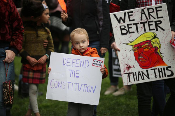 Thousands of demonstrators across US say 'Not My President'